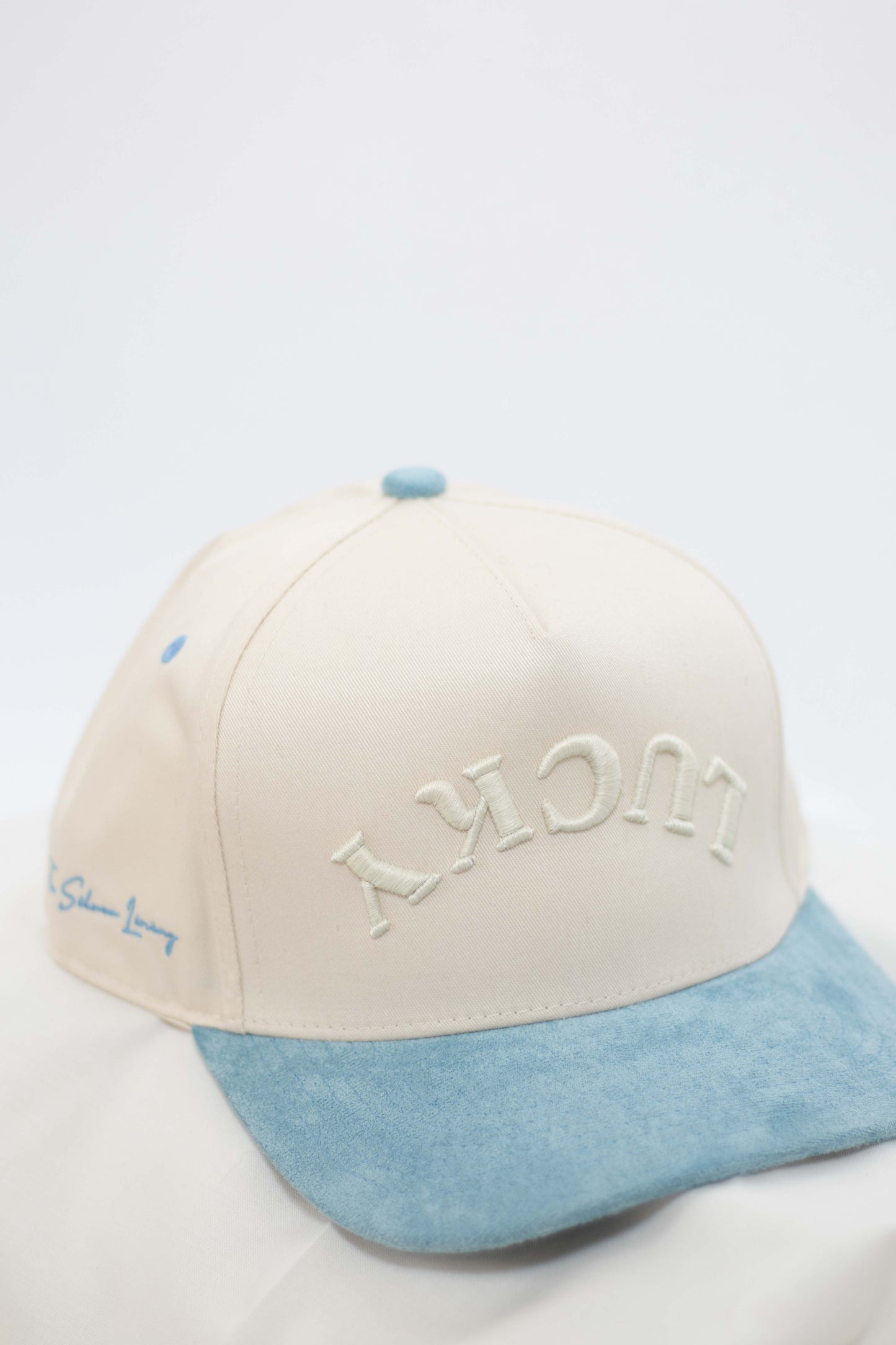 LUCKY Blue Trucker Hat
